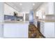 Updated kitchen featuring stainless steel appliances, marble countertops, and ample cabinet space at 15039 S 28Th St, Phoenix, AZ 85048