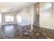 Open floor plan living room featuring tile flooring, neutral paint, vaulted ceiling and staircase at 15039 S 28Th St, Phoenix, AZ 85048