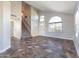 Inviting living room featuring vaulted ceiling, abundant natural light, and staircase access at 15039 S 28Th St, Phoenix, AZ 85048