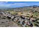 Expansive aerial view of a golf community, showcasing stunning homes and mountain views at 1635 E Silverwood Dr, Phoenix, AZ 85048