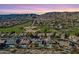 Beautiful community view with lush green golf course and majestic mountain backdrop at 1635 E Silverwood Dr, Phoenix, AZ 85048