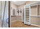 Walk-in closet with open shelving at 1635 E Silverwood Dr, Phoenix, AZ 85048