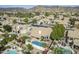 Overhead view of a single-story home with a backyard pool and lush landscaping at 1835 E Brookwood Ct, Phoenix, AZ 85048