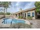 Backyard with a pool, a basketball hoop and seating area and low maintenance desert landscaping at 1835 E Brookwood Ct, Phoenix, AZ 85048