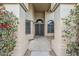 Inviting front entrance with decorative columns and a detailed double-door entryway at 1835 E Brookwood Ct, Phoenix, AZ 85048