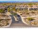 Aerial view featuring well-planned community streets and lush desert landscaping, creating a harmonious blend of nature and design at 19475 N Grayhawk Dr # 2119, Scottsdale, AZ 85255