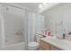 Well-lit bathroom featuring a shower-tub combo, sink, and generous counter space at 2035 S Elm St # 217, Tempe, AZ 85282