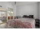 Spacious bedroom features a bed, dresser, and ensuite bathroom with a large mirror at 2035 S Elm St # 217, Tempe, AZ 85282
