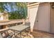 Charming outdoor patio with a table and chairs, perfect for enjoying the fresh air at 2035 S Elm St # 217, Tempe, AZ 85282