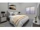 Comfortable bedroom with contemporary decor and neutral color palette at 22436 N 48Th St, Phoenix, AZ 85054
