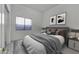 Cozy bedroom with soft lighting and minimalist design elements at 22436 N 48Th St, Phoenix, AZ 85054