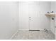 Laundry room with shelving and vinyl flooring at 22436 N 48Th St, Phoenix, AZ 85054