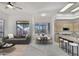 Open-concept living space with dining area, kitchen, and comfortable seating at 22436 N 48Th St, Phoenix, AZ 85054