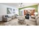 The living room is bright with an open concept to the kitchen and dining area at 22927 N 41St St, Phoenix, AZ 85050