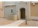 Building with a private entrance, stone accents, and well-kept landscaping at 240 W Juniper Ave # 1010, Gilbert, AZ 85233