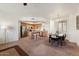 Cozy dining area adjacent to the kitchen, complete with a stylish table and contemporary lighting at 2402 E 5Th St # 1521, Tempe, AZ 85288