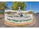 Welcoming entrance to a 55+ community with beautifully landscaped fountain and signage at 2650 W Union Hills Dr # 29, Phoenix, AZ 85027