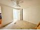 Bedroom featuring carpeting, ceiling fan, and a walk-in closet, as well as an ensuite bathroom at 2650 W Union Hills Dr # 346, Phoenix, AZ 85027