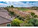 Backyard featuring desert landscaping and beautiful views of a lush green golf course at 29412 N 128Th Ln, Peoria, AZ 85383