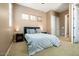 Cozy bedroom with carpet, two closets, and neutral paint at 29412 N 128Th Ln, Peoria, AZ 85383