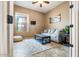 Comfortable living room features neutral paint and tile floors at 29412 N 128Th Ln, Peoria, AZ 85383