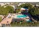 A relaxing community pool and spa are surrounded by mature landscaping and lounging areas at 3031 N Civic Center Plz # 261, Scottsdale, AZ 85251