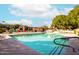 Relaxing community pool with lounge chairs and shade offers the perfect retreat at 3031 N Civic Center Plz # 261, Scottsdale, AZ 85251