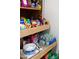 Well-stocked pantry featuring pull-out shelves filled with snacks, beverages, and other food items at 3031 N Civic Center Plz # 261, Scottsdale, AZ 85251