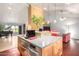 Open concept kitchen and living space featuring modern appliances, natural light, and scenic views at 3101 E Acoma Dr, Phoenix, AZ 85032