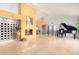 Spacious living area showcasing modern design with a unique fireplace and elegant decor, creating a warm ambiance at 3101 E Acoma Dr, Phoenix, AZ 85032
