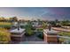 Street view of landscape and homes in the distance at 3101 E Acoma Dr, Phoenix, AZ 85032