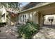 Inviting covered porch with comfortable seating and mature landscaping offer a relaxing outdoor space at 34 W Vernon Ave, Phoenix, AZ 85003