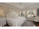 Serene main bedroom with large windows providing ample natural light and backyard views at 34 W Vernon Ave, Phoenix, AZ 85003