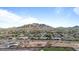 Scenic aerial view showcasing the community with a mountain backdrop at 3716 E Andre Ave, Gilbert, AZ 85298