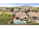 Aerial view of a home with a private pool and covered patio at 3716 E Andre Ave, Gilbert, AZ 85298