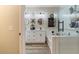 Bright bathroom featuring a walk-in shower, soaking tub, dual sinks, and sleek fixtures at 3716 E Andre Ave, Gilbert, AZ 85298