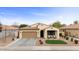 Charming single-story home with a well-maintained front yard and two-car garage at 3716 E Andre Ave, Gilbert, AZ 85298