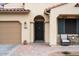 Inviting front entrance with a decorative door, brick pathway, and cozy seating at 3716 E Andre Ave, Gilbert, AZ 85298