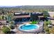 Aerial view of outdoor space including hot tub and swimming pool with mountain backdrop at 40445 N 32Nd St, Cave Creek, AZ 85331