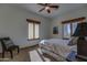 Cozy bedroom with natural light, calming colors, and a comfortable chair perfect for relaxation at 40445 N 32Nd St, Cave Creek, AZ 85331
