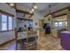 Spacious dining area with wooden table, tile floors, and abundant natural light at 40445 N 32Nd St, Cave Creek, AZ 85331