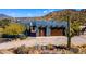 Charming single Gathering home featuring a large garage, solar panels, and desert landscaping at 40445 N 32Nd St, Cave Creek, AZ 85331