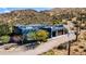 Beautiful single-Gathering home featuring a large garage, solar panels, and desert landscaping at 40445 N 32Nd St, Cave Creek, AZ 85331
