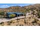 Beautiful single Gathering home featuring a large garage, solar panels, and desert landscaping at 40445 N 32Nd St, Cave Creek, AZ 85331