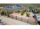 Desert home featuring solar panels, gray stucco exterior, a black fence, and native desert landscaping at 40445 N 32Nd St, Cave Creek, AZ 85331