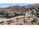 Aerial view of a well-maintained single Gathering home with garage, solar panels and natural landscaping at 40445 N 32Nd St, Cave Creek, AZ 85331