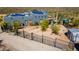 Exterior of desert home with native plants and black wrought iron fence in a natural desert landscape at 40445 N 32Nd St, Cave Creek, AZ 85331