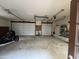 Spacious two-car garage with ample storage space and a motorcycle, perfect for car enthusiasts at 40445 N 32Nd St, Cave Creek, AZ 85331