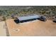 Aerial shot of open-air horse shelter with parking for multiple trucks or trailers at 40445 N 32Nd St, Cave Creek, AZ 85331