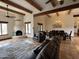 Open concept home design showing the living and dining areas with kiva fireplace at 40445 N 32Nd St, Cave Creek, AZ 85331